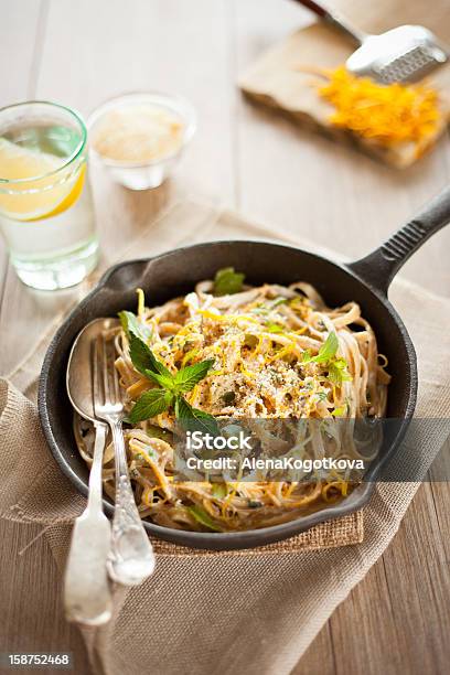 Whole Grain Linguine With Citrus Zest And Mint Stock Photo - Download Image Now - Pasta, Whole Wheat, Cheese