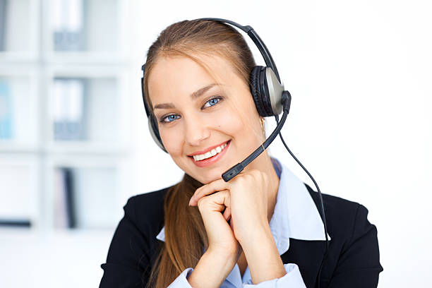 istock Portrait of pretty young female operator 158754724