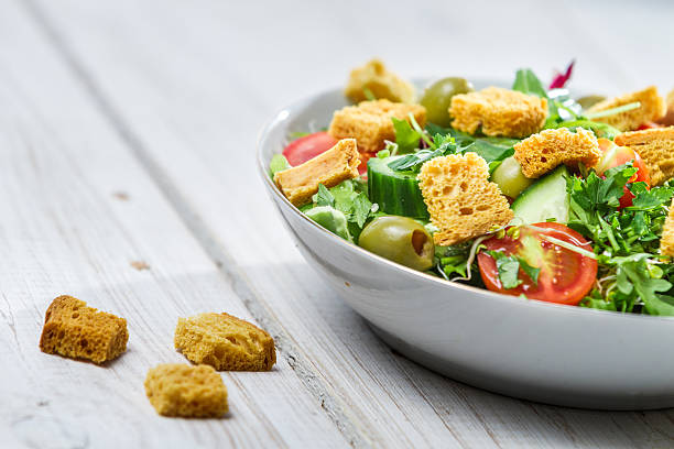 istock Close-up on a fresh arugula salad with tomatoes 158754837