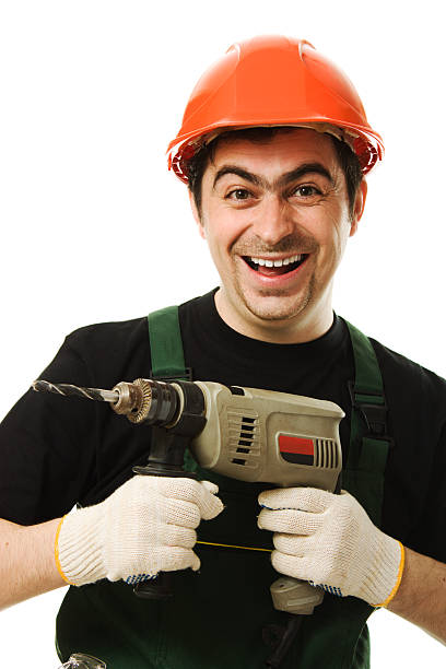 istock Male worker with an electric dril 158758110