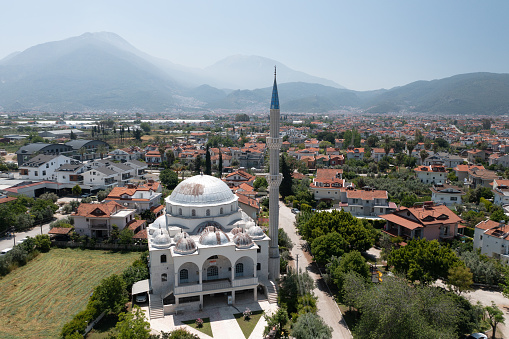 Above view of beautiful mosque against Fethiye city in Turkiye