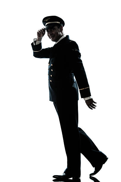 istock man in airline pilot uniform silhouette walking 158761819