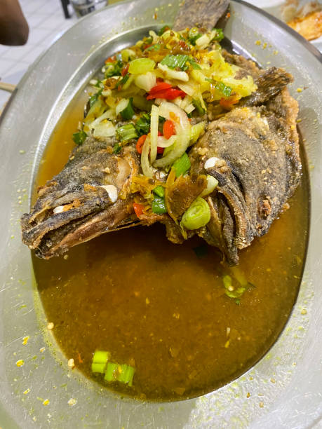 istock Asian seafood dishes on the table 1587629998