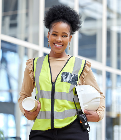 Black woman, blueprint or portrait of architect on construction site for project management. Engineering, confident or happy designer with floor plan for architecture, development or innovation