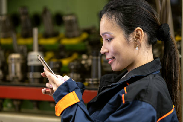 istock Woman worker at the machine 1587637939