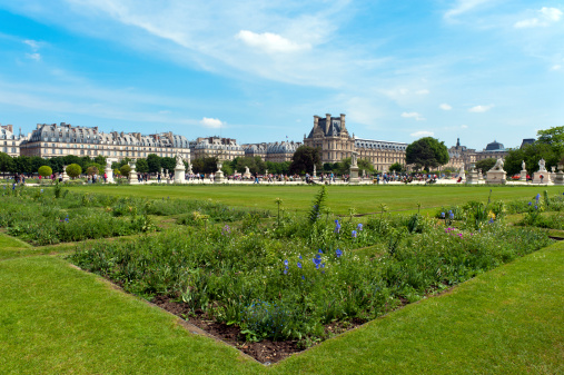 The Tuileries Gardens with the Louvre in the background.