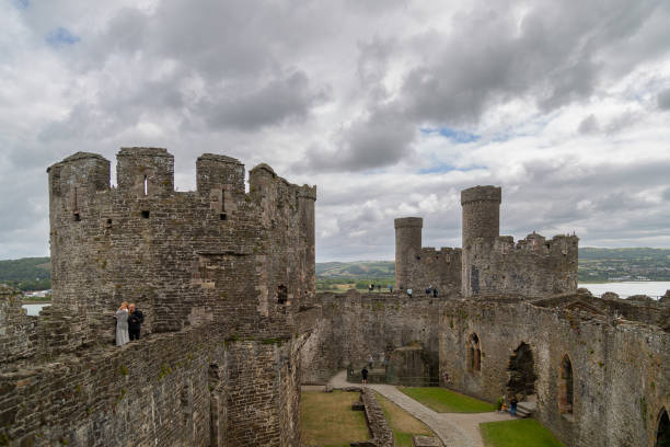 Conwy Castle built by Edward I, during his conquest of Wales, between 1283 and 1287 Conwy, Wales - July 2nd 2023: Conwy Castle built by Edward I, during his conquest of Wales, between 1283 and 1287 conwy castle stock pictures, royalty-free photos & images