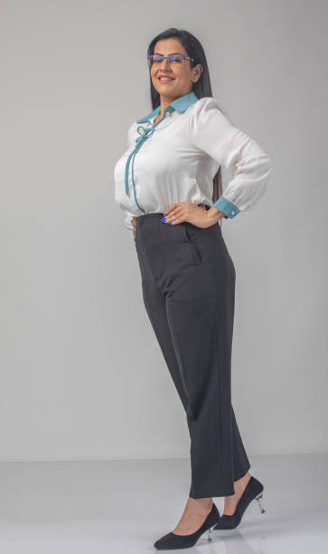 istock Businesswoman standing on white background 1587667765