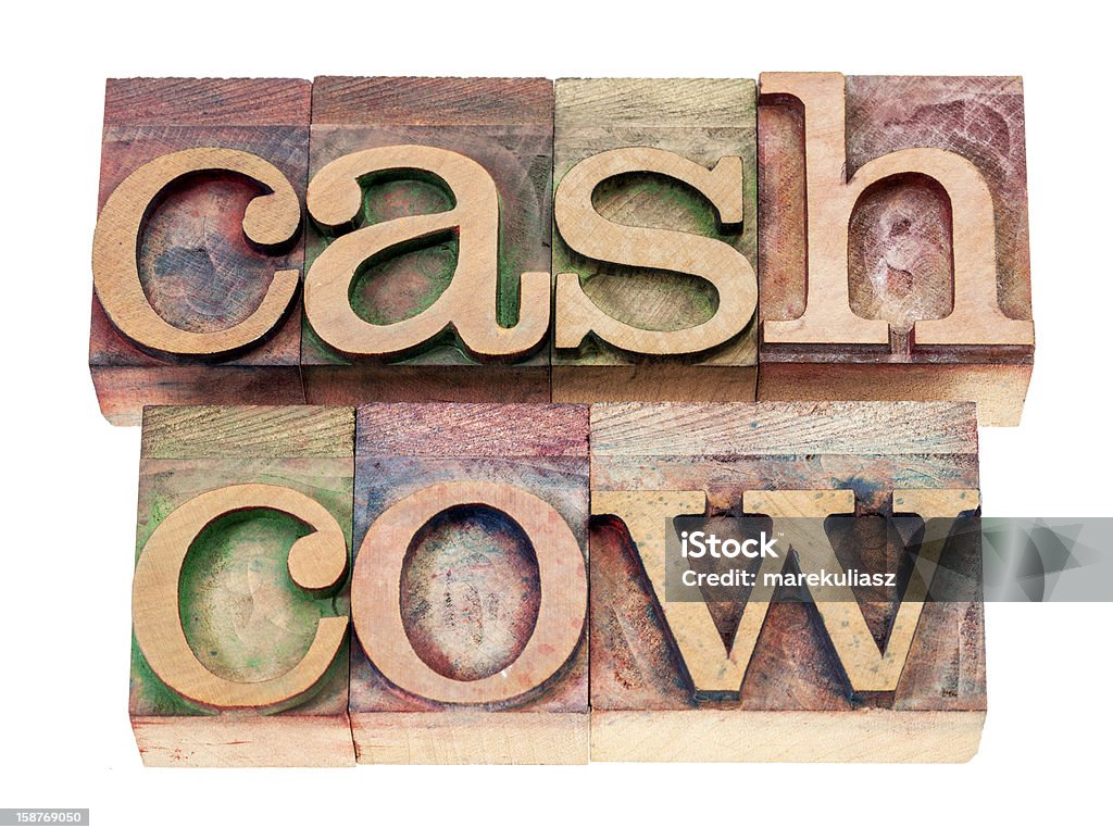 cash cow in tipo legno - Foto stock royalty-free di Cash cow - Modo di dire inglese