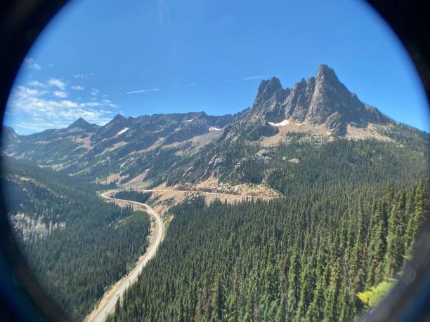 through the lens - the view from the washington pass overlook trail (5477') of liberty bell mountain (7720'). hiking in the north cascades national park - july 2023. liberty bell mountain stock pictures, royalty-free photos & images