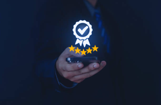 istock Businessman showing 5 star quality 1587734206