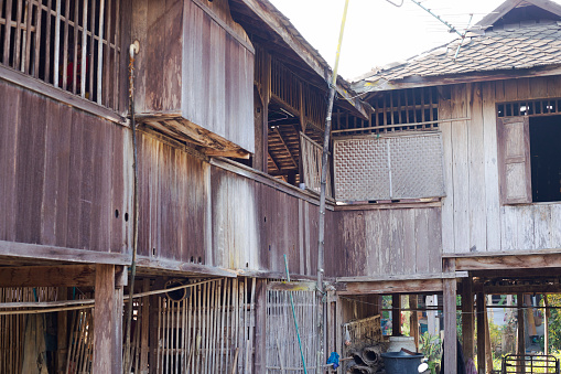 Old weathered wooden thai stilt houses near On Tai, Chiang Mai, San Kamphaeng district of Chiang Mai