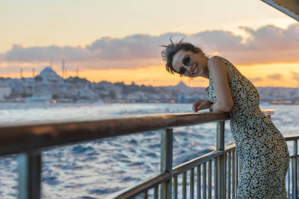 istock Portrait of young lady at sunset. 1587793183