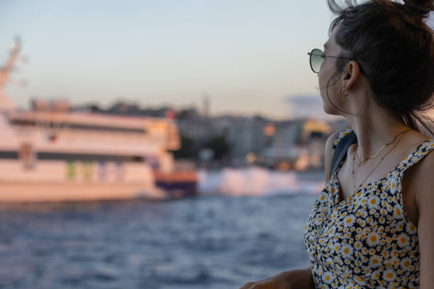 istock Portrait of young lady at sunset. 1587793777