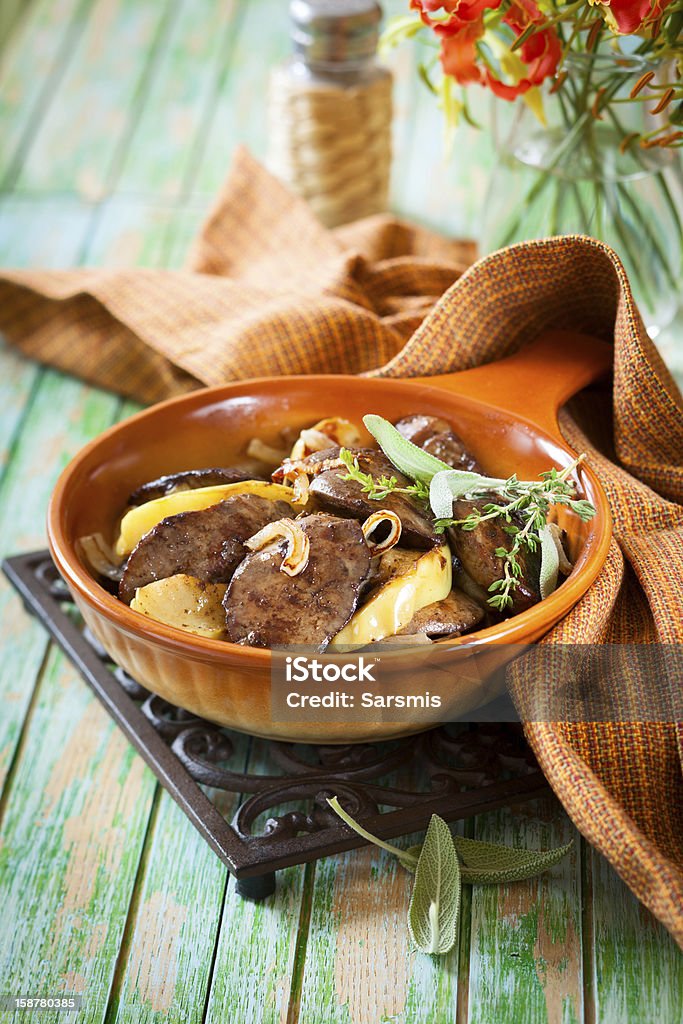 Chicken livers with apple Pan-Fried Chicken Livers With Apple, Onion and Sage Apple - Fruit Stock Photo