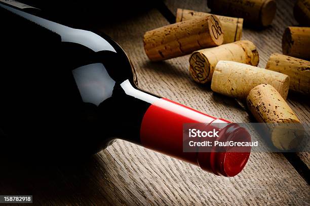 Bottle Of Red Wine And Corks Stock Photo - Download Image Now - Alcohol - Drink, Beige, Bottle