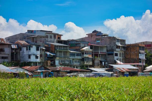 istock Quaint small town surrounded by lush green foliage 1587830850