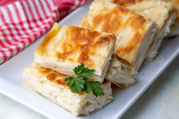 istock Delicious Turkish food; Tray pastry; (Turkish name; Su boregi) 1587842396
