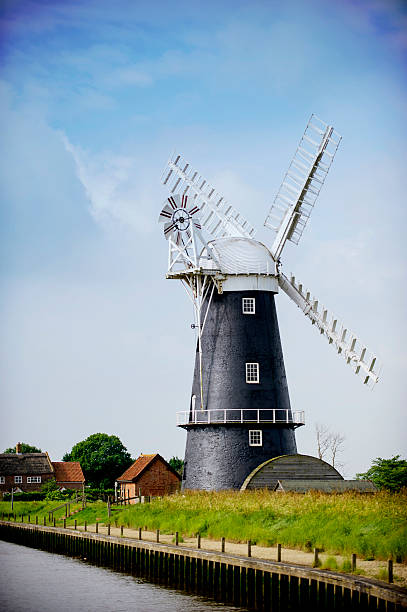 istock Nofolk Broads black and white windmill 158784360