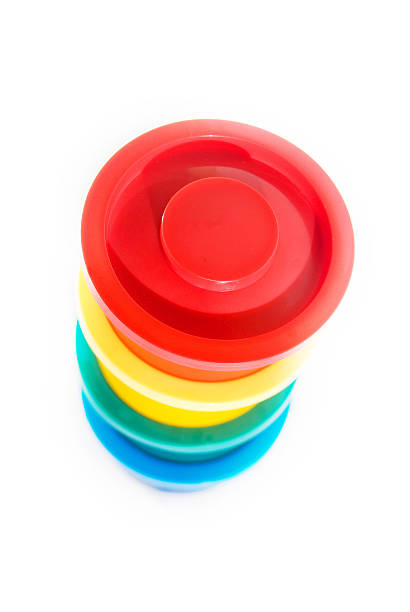 istock isolated red,yellow,blue, green finger paint containers 158784609