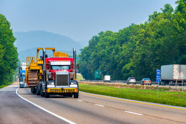 istock Heavy Machinery Being Transported On Tennessee Interstate Highway 1587854269