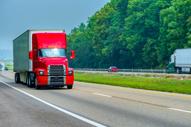 istock Modern Red Semi Truck On The Interstate 1587855336