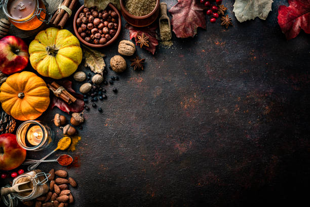 istock Autumn or Thanksgiving holiday decoration on dark table. Copy space 1587866297