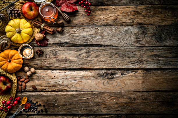 istock Autumn or Thanksgiving holiday decoration on rustic wood table. Copy space 1587866338