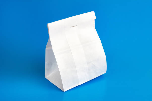 istock Paper bag with coffee beans, sewn with thread. Dry food packaging. 1587867366