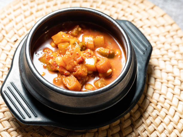 istock Soybean paste stew in an earthenware bowl, Korean food 1587874144