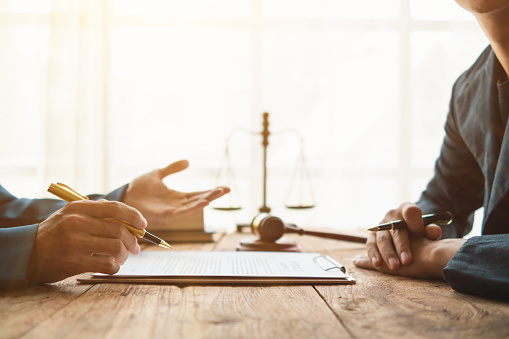 contract of sale was placed on the table in the lawyer office because the company hired the lawyer office as a legal advisor and drafted the contract so that the client could sign the right contract.