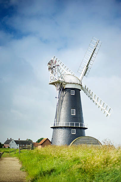 istock Norfolk Broads black and white windmill 158791850