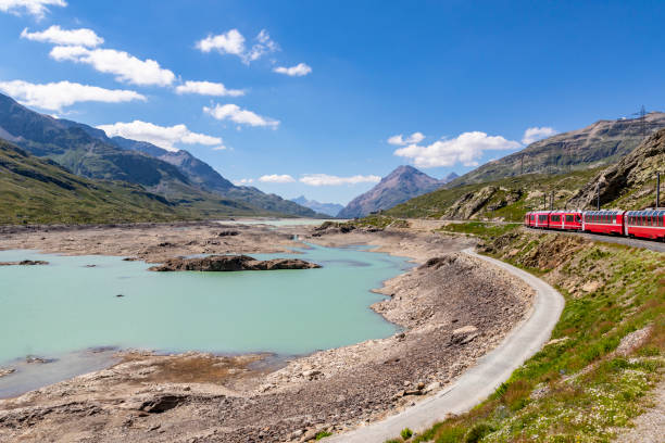 istock Bernina Express railway line alongside Lago Bianco 1587919277