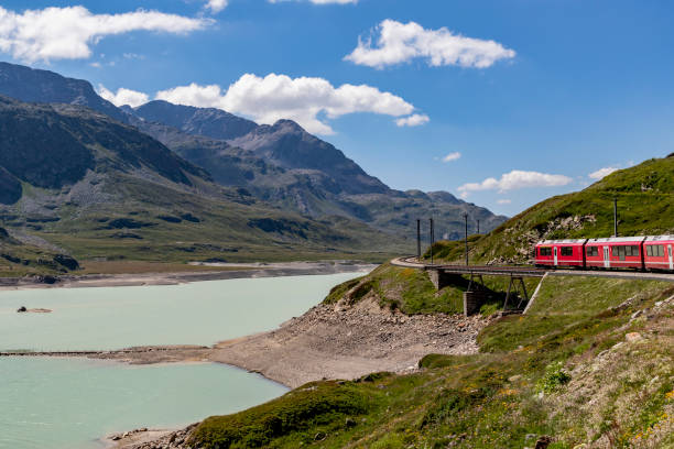 istock Bernina Express railway line alongside Lago Bianco 1587919796