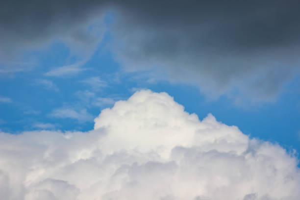 Sunny weather slowly being taken over by storm clouds on a summer day in Zaltbommel