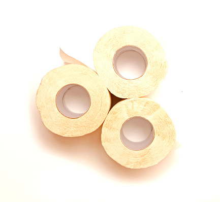 Top view,three rolls of toilet paper isolated on white background.