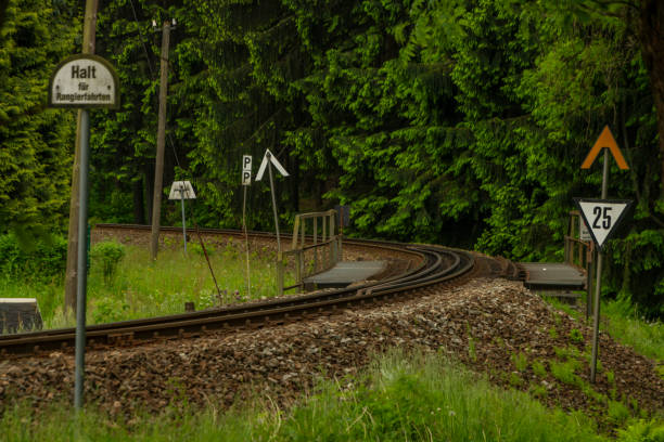 Railway tracks in summer cloudy fresh day near Neudorf in Germany