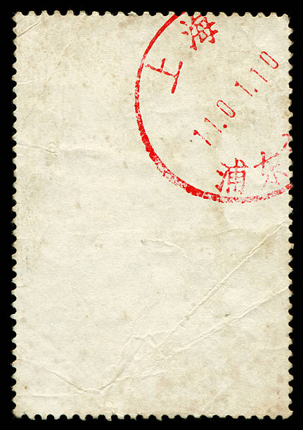 Blank postage stamp textured background with postmark Blank postage stamp textured with Shanghai postmark isolated on black background. chinese postage stamp stock pictures, royalty-free photos & images