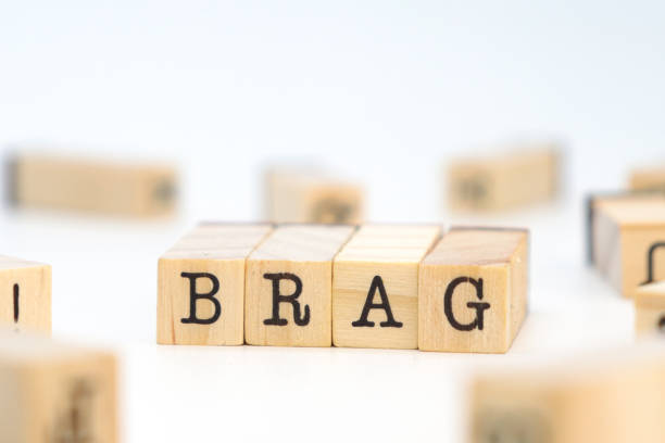 istock brag word on wooden cubes 1587996729
