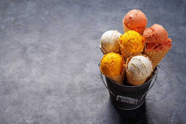 istock Assorted ice cream flavours in delightful waffle cones 1588007858
