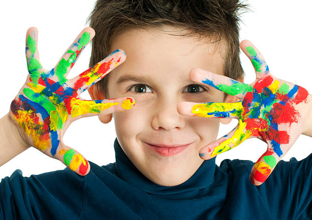 istock Boy hands painted with colorful paint 158802074