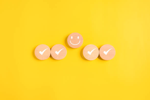 istock Happy smile face emotion and correct icons on background, Customer service evaluation, Positive thinking and mental health assessment, Happy client giving feedback with happiness 1588030665