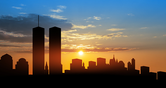 New York skyline silhouette with Twin Towers at sunset. 09.11.2001 American Patriot Day banner.