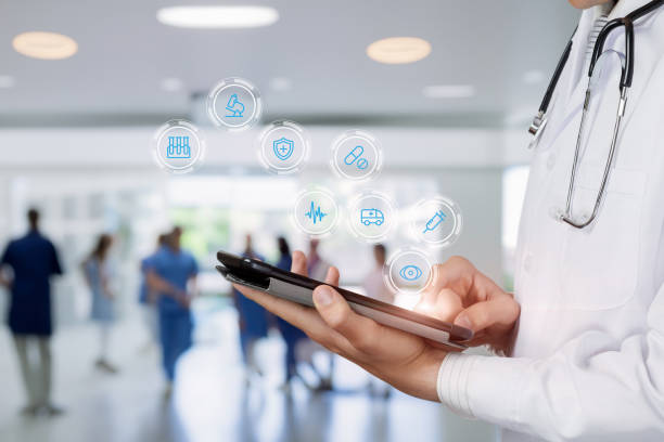 istock The doctor works on a tablet with a medical interface. 1588095605