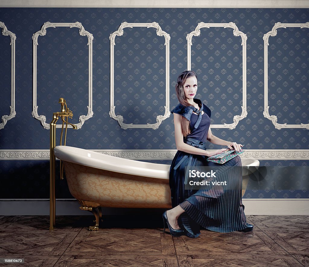 woman on  bathtub woman , sitting on the vintage bathtub (photo compilation) Free Standing Bath Stock Photo