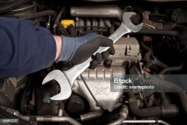 Mechanical Repairs A Car In The Garage Stock Photo - Download Image Now - Adult, Adults Only, Assistance