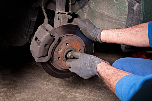 istock Man repairing a brakes 158812349