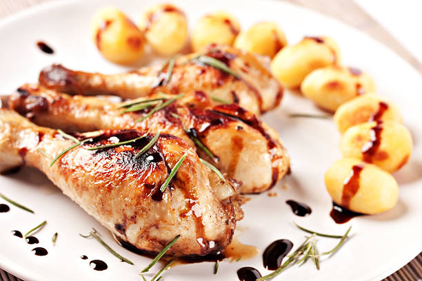 Roast chicken with potatoes on a plate