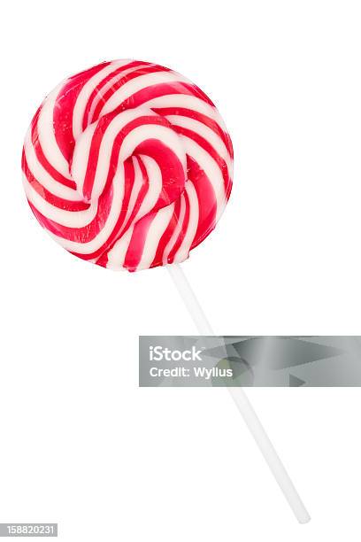 Foto de Vermelho E Branco Em Espiral Lollipop e mais fotos de stock de Alimentação Não-saudável - Alimentação Não-saudável, Açúcar, Branco