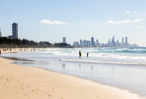 istock People enjoying sunny day at the beach, background with copy space 1588206197